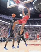  ?? ?? Ohio State's Zed Key dunks in Tuesday's win over Duke. Key scored a career-high 20 points.