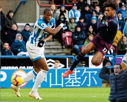  ??  ?? LETHAL: Alex Iwobi scores Arsenal’s first (left) before Alexandre Lacazette’s strike set off Unai Emery’s celebratio­n