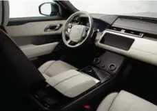  ??  ?? Inside the Range Rover Velar, the automaker has gone for the cleanest look possible with premium materials everywhere