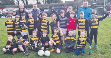  ?? ?? Our U9s who played Ballinora, pictured with their mentors.