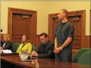  ?? TRACEY READ—THE NEWS-HERALD ?? Nathaniel Brown pleads guilty Dec. 12 in Lake County Common Pleas Court to involuntar­y manslaught­er. From left are Willoughby Hills Detective Ron Parmertor, County Appellate Division Supervisin­g Attorney Karen Sheppert, Chief Assistant County...