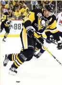  ?? (Reuters) ?? EVGENI MALKIN has to carry a larger load for the Pittsburgh Penguins, with captain Sidney Crosby out with a concussion. The Penguins still hold a 3-1 series lead over the Washington Capitals heading into Saturday’s pivotal Game 5 in Washington.
