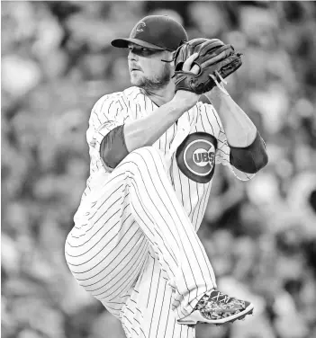  ?? KAMIL KRZACZYNSK­I, USA TODAY SPORTS ?? Cubs pitcher Jon Lester, above, finished second to teammate Kyle Hendricks in the National League in ERA. Lester sported a 2.44 ERA to Hendricks’ 2.13.