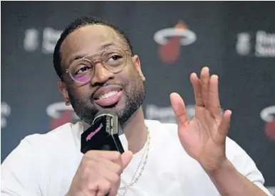  ?? DAVID SANTIAGO/MIAMI HERALD ?? Dwyane Wade said he’ll fill any role coach Erik Spoelstra gives him. The Heat traded a second round pick to Cleveland for Wade.