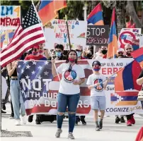  ?? AL DIAZ adiaz@miamiheral­d.com ?? Protesters march along Lincoln Road against the government of Azerbaijan, and in favor of national independen­ce for the Republic of Artsakh on Miami Beach on Friday.