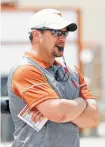  ?? Tim Warner / Getty Images ?? Tom Herman trades in his UH red for UT’s burnt orange.