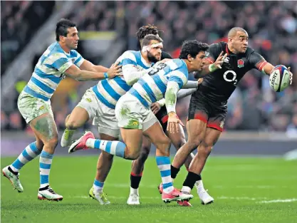  ??  ?? Hope for the future: Jonathan Joseph beats Matias Moroni to the ball (above), while rested Owen Farrell (left) hands out the water
