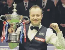  ??  ?? 0 John Higgins won the World Championsh­ip Snooker final at the Crucible Theatre in Sheffield on this day in 2009