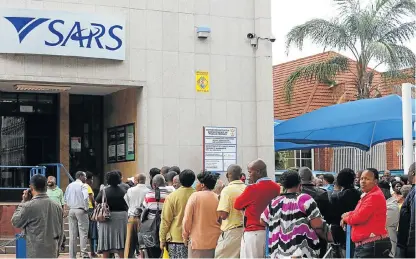  ?? /Elijar Mushiana /Sowetan ?? Written in the SARS: Tax payers from different parts of Limpopo queue up to file their income tax returns at the SARS office in Polokwane. Finance Minister Nhlanhla Nene and South African Revenue Service acting commission­er Mark Kingon face the challenge of poor tax compliance in 2017-18 by of the country’s many citizens.