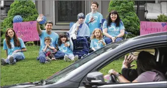  ?? MARSHALL GORBY / STAFF ?? The community of Lebanon participat­ed in a Welcome Home Parade for Emma Palmer on Friday. Members of Emma’s swim team, classmates, teachers, friends and family took part in the parade along with the police and fire department­s. Emma collapsed at swim practice Jan. 28 to begin her 3 1/2 month ordeal.