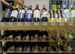  ?? ?? The Canadian Press
Bottles of British Columbia wine on display at a liquor store in Cremona, Alta.