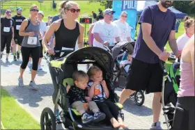  ?? PHOTOS COURTESY VANESSA T. MARCOTTE FOUNDATION ?? People participat­e in the 2019 Vanessa T. Marcotte Foundation 5K Run/ Walk, the familyfrie­ndly annual fundraiser that returns to in person on June 18 at Wachusett Mountain in Princeton.