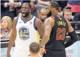  ?? JOSHUA GUNTER/CLEVELAND.COM VIA AP ?? Draymond Green, left, and the Golden State Warriors will go for a sweep of LeBron James, right, and the Cleveland Cavaliers tonight.