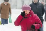  ?? Denis Tyrin/the Associated Press ?? A Volgograd resident cries following Monday’s terrorist bomb blast aboard a trolleybus that killed at least 14 people. On Sunday, another blast in the city’s main railway station killed at least 17.