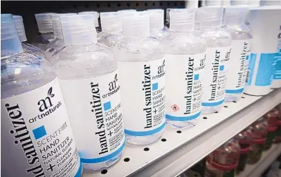  ?? TIFFANY HAGLER-GEARD/BLOOMBERG ?? ArtNatural­s hand sanitizer is displayed for sale at a store in Ardsley, New York, on March 19.