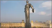  ??  ?? The monument of Gagarin in Moscow was built in 1980 and became a Moscow landmark. Gagarin’s statue stands on a pedestal made to resemble rocket exhaust and is made of titanium. It’s 138-feet high and weighs 12 tons.
(AP/Maxim Marmur)