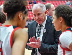  ?? (NWA Democrat-Gazette/Hank Layton) ?? Coach Rickey Smith (center) and the Fort Smith Northside Lady Bears can wrap up the No. 2 seed from the 6A-West with a win at Springdale today.