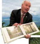  ?? PROVIDED BY THE GOVERNOR’S OFFICE ?? Governor Hutchinson shows a book of scenic photos of Arkansas. The state’s nickname is “The Natural State’’. It was adopted by the legislatur­e in 1995 to emphasize Arkansas’ beautiful landscape and relatively untouched nature. The state has three...