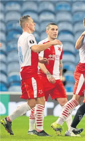  ?? ?? Glen Kamara squares up to Ondrej Kudela, with Connor Goldson ready t