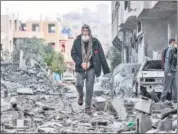  ?? AFP ?? A man walks amid the rubble of a home after it was destroyed in an Israeli strike in Deir el-Balah, Gaza Strip on Wednesday.