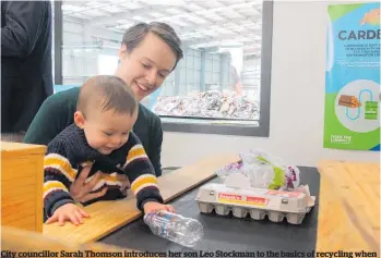  ?? Photo / Danielle Zollickhof­er ?? City councillor Sarah Thomson introduces her son Leo Stockman to the basics of recycling when the Education Room opened at the Envirowast­e centre in Te Rapa in 2021.