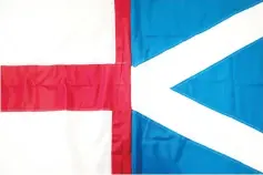  ?? — AFP photo ?? England's St George's Cross flag (left) and Scotland's Saltire.