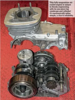  ??  ?? This fully magnesium aircooled engine is unique in Honda engineerin­g with its one-piece top crankcase and cylinder! It's mechanical­ly rather simple, a clue to reliabilit­y.