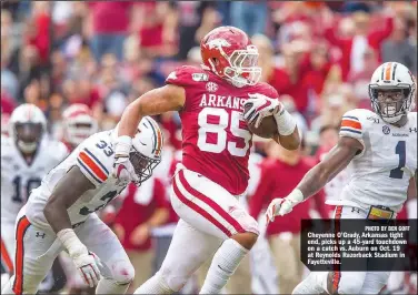  ?? PHOTO BY BEN GOFF ?? Cheyenne O’Grady, Arkansas tight end, picks up a 45-yard touchdown on a catch vs. Auburn on Oct. 19 at Reynolds Razorback Stadium in Fayettevil­le.