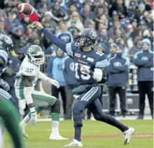  ?? STAN BEHAL/ TORONTO SUN ?? Toronto Argonauts’ quarterbac­k Ricky Ray throws down field against the Saskatchew­an Rough Riders during the East Division final at BMO Field, on Sunday. The Argos’ booked their ticket to the Grey Cup by beating the Riders 24-21 on the final drive of...