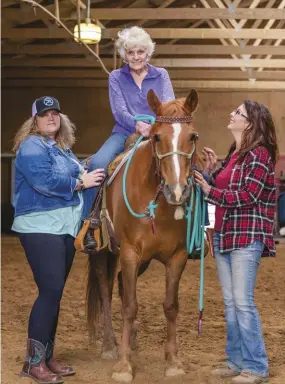  ??  ?? Cathy Florman got to feel the joy of being on horseback again due to Grace’s special training.