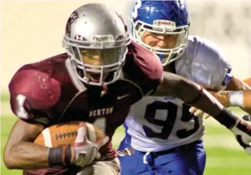  ?? ADG FILE PHOTO ?? Bryant’s Michael Smith chases down Benton’s Wallace Foote during the 2011 Salt Bowl at War Memorial Stadium in Little Rock.