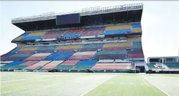  ?? TROY FLEECE ?? The benches, turf and goalposts are among the items up for auction at the old Mosaic Stadium.