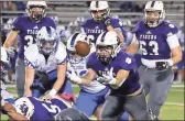  ?? / Jeremy Stewart ?? Darlington’s Cam Watson reaches out to recover the ball after a fumble during the first quarter.