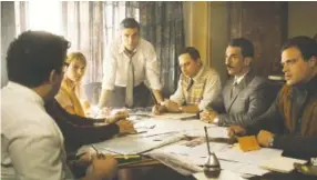  ?? METRO GOLDWYN MAYER PICTURES ?? Facing camera from left, Melanie Laurent as Hanna Regev, Oscar Isaac as Peter Malkin, Nick Kroll as Rafi Eitan, Michael Aronov as Zvi Aharoni and Greg Hill as Moshe Tabor in “Operation Finale.”