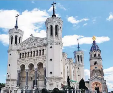  ??  ?? Perched atop Lyon’s Fourviere Hill, Notre-Dame Basilica has an interior covered with elaborate mosaics depicting stories about the Virgin Mary. STEVE SMITH/RICK STEVES’ EUROPE