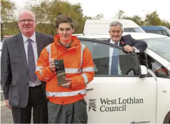  ??  ?? Winner Joe Drew, fleet and community transport manager; Connor Waldron and Cllr Tom Conn.