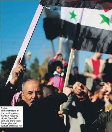  ?? AFP ?? Syrian demonstrat­ors in the north-eastern Kurdish-majority city of Qamishli demand protection from a planned Turkish offensive