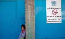  ?? Photograph: Jaafar Ashtiyeh/AFP/ Getty Images ?? A pupil standing at the entrance of an Unrwa school in the occupied West Bank.