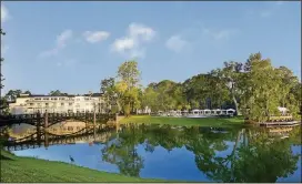  ?? PHOTOS BY MONTAGE PALMETTO BLUFF VIA THE NEW YORK TIMES ?? The lagoon behind the main inn at Montage Palmetto Bluff. This traditiona­l resort that has modernized its Old South feel has been called one of the world’s most romantic hotels.