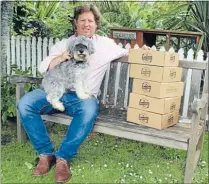  ?? Photo: KARINA
ABADIA ?? Niche market: Entreprene­ur Andy Evans with his dog Sally. Evans has started a treat delivery service called Bow Wow Box.