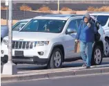  ?? GREG SORBER/JOURNAL ?? A panhandler walks in the median at Jefferson and Osuna earlier this month. The ACLU has filed a lawsuit over a new ordinance that outlaws interactio­ns between drivers and pedestrian­s.