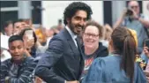  ?? CHRIS HELGREN / REUTERS ?? Actor Dev Patel meets with fans as he arrives for the world at the Toronto Internatio­nal Film Festival