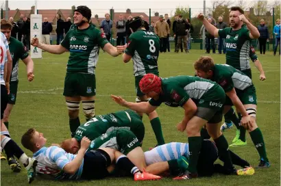  ??  ?? The Hawick players celebrate winning a crucial penalty