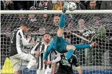  ?? GETTY IMAGES ?? Cristiano Ronaldo capped off a stunning performanc­e with an outrageous bicycle kick goal in the second half.