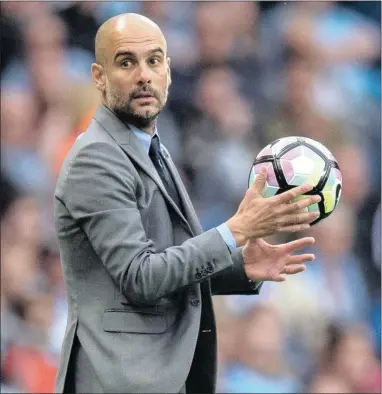  ??  ?? RICH PICKINGS: Manchester City manager Pep Guardiola has been active during the summer transfer window.