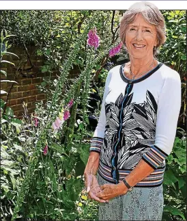  ??  ?? Passion for plants: Carole Lee takes great pleasure from her garden