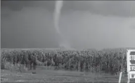  ?? DAVE PATRICK PHOTO ?? Dodging hail and outrunning tornadoes are normal for Dave Patrick, all in a day’s work. The Fergus resident is a storm chaser. This is a tornado he chased near Arthur in 2013.