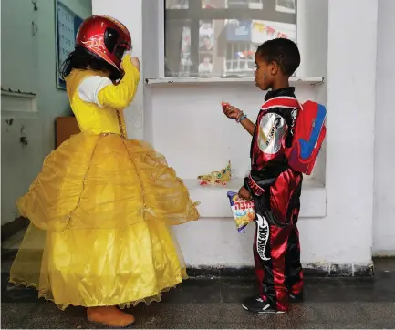  ??  ?? CHILDREN DRESS up for Purim.