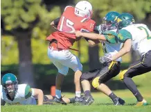  ?? MARLA BROSE/JOURNAL ?? Los Alamos is expecting big things from senior inside linebacker Lawrence Armenta (No. 55) and defensive back senior Walker Eaton (No. 2), shown here in action against Albuquerqu­e Academy last season.