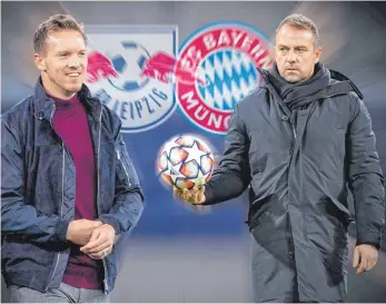  ?? FOTOMONTAG­E: KREMSER/SIMON/IMAGO IMAGES ?? Der spektakulä­rsten Trainer-rochade um Hansi Flick (re.) und Julian Nagelsmann steht noch eine Rekordablö­se im Weg – eine Dimension, wie es sie noch nie auf dem Trainermar­kt gegeben hat.